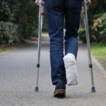 man on crutches with hurt foot | workers comp attorney