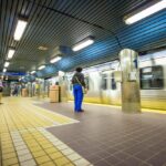 three people waiting on subway train | public transit injury attorney