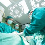 three doctors conducting surgery | medical malpractice attorney