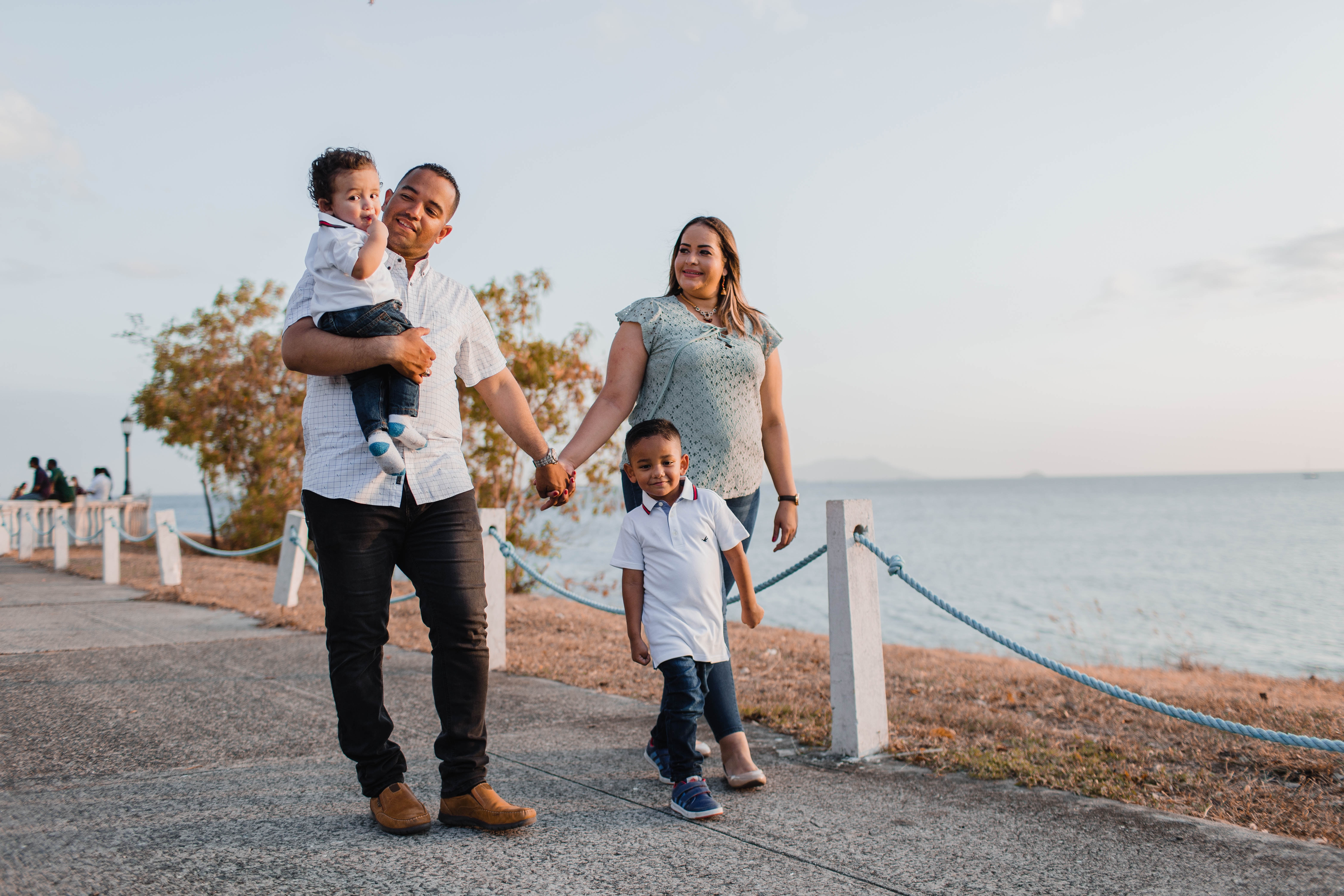 family of 4 walking by ocean | medical malpractice attorney