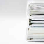 three binders stacked | workers compensation lawyer