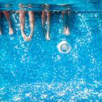kids feet underwater in pool | premises liability attorney